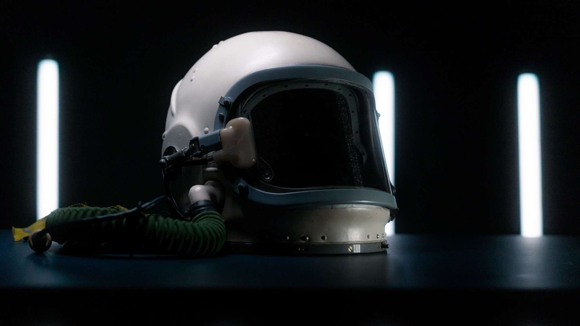 Space helmet with white lights in the background